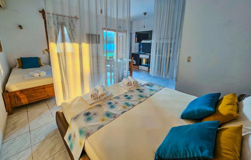 Spacious Studio with Semi-Private Bedroom & Pool-View Terrace